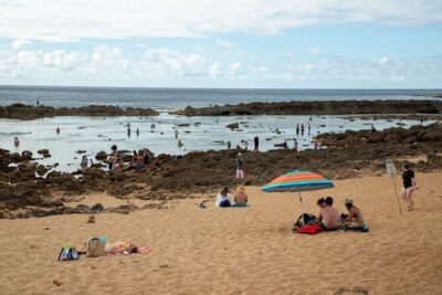 Best Of Oahu: Grand Circle Island Small Group Tour From Waikiki - Diamond Head and Hanauma Bay: cliffs first, then the bay overlook