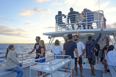 BYOB Sunset Cruise Waikiki - Waikiki coastline and Honolulu skyline in that last-light glow