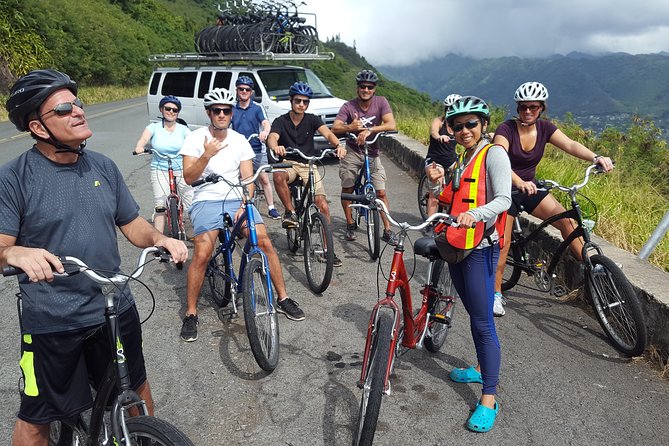 Downhill Bike and Ko'olau Waterfall Hike Tour - Views over Waikiki and Manoa Valley: the payoff is worth the climb in the story