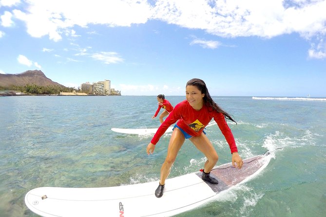 Exclusive Group Surfing Lesson with Waikiki Courtesy Shuttle - Sand Instruction That Sets You Up for Standing