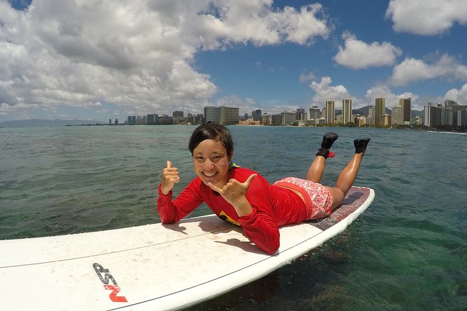 Exclusive Group Surfing Lesson with Waikiki Courtesy Shuttle - Getting Leashed and Learning in the Ocean