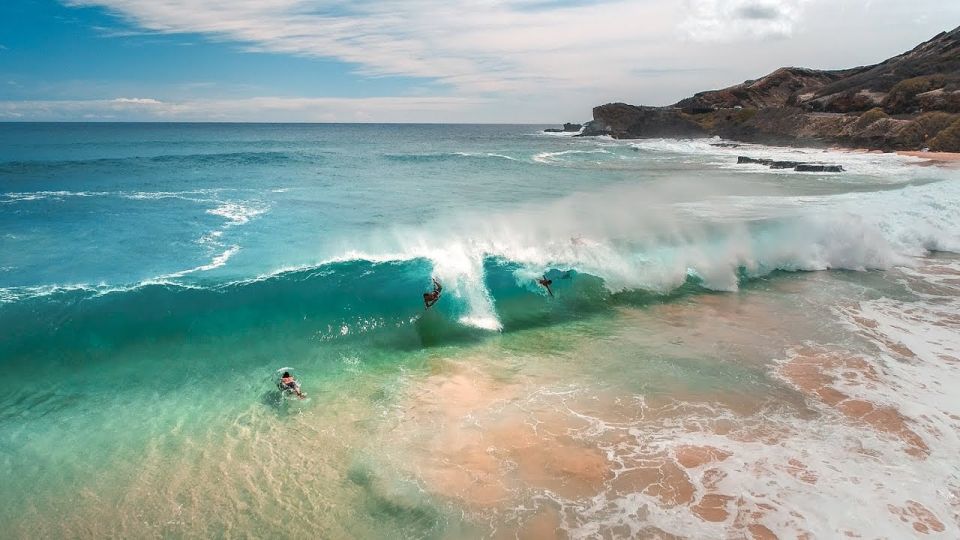 From Waikiki: Circle Island Tour - North Shore energy: Banzai Pipeline and Sharks Cove viewpoints