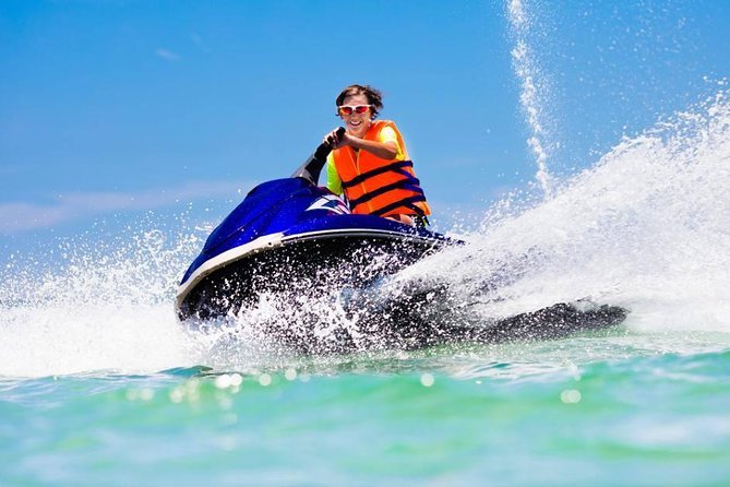 Jet Ski Ride Maunalua Bay. Tandem-2 people ride-price per person - Goggles, phones, and the photo package cost you should plan for