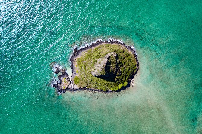 Mokolii Island Self Guided Kayak Tour - The water portion: paddling with Koolau Range views