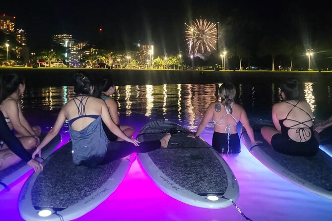 Night SUP Yoga and Fireworks at Magic Island - The LED-lit SUP yoga flow: from standing poses to float meditation