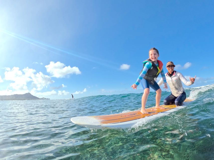 Oahu: Kids Surfing Lesson in Waikiki Beach (up to 12) - Tandem surf: the hand-holding part that changes everything