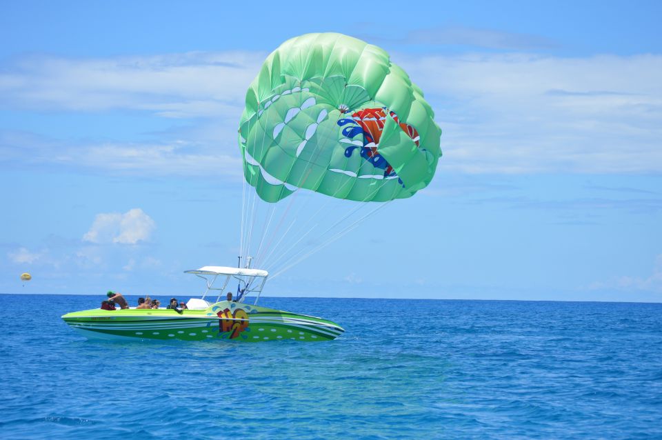 Oahu: Parasail on Maunalua Bay with Diamond Head Views - The Captain’s Dunk and Landing Back on the Boat