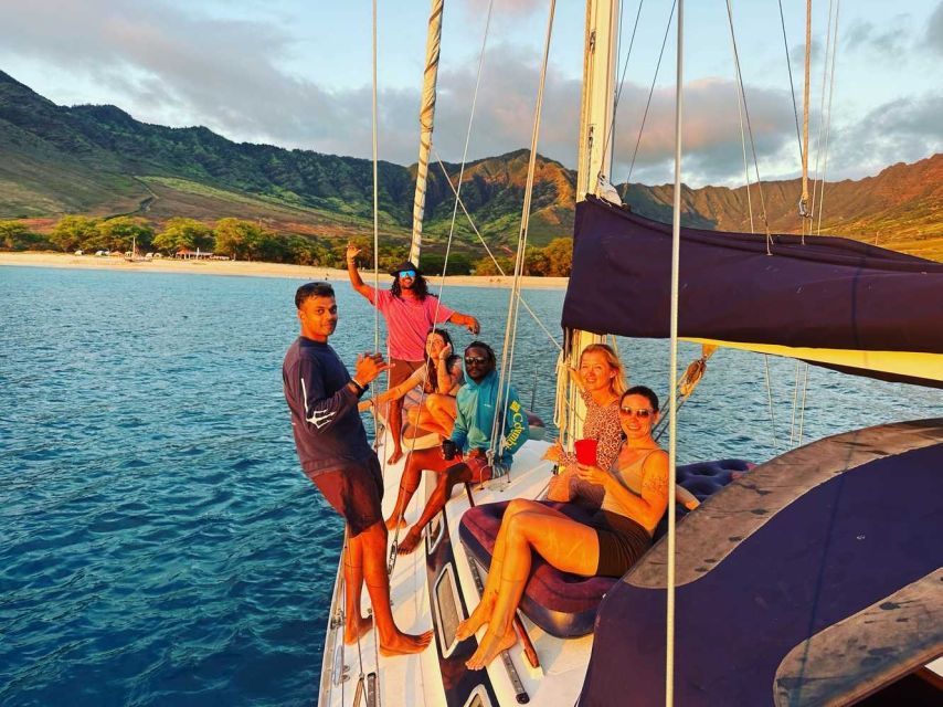 Oahu: Sunset sailing in small intimate groups - Golden hour timing: city lights turning on and the moon rising