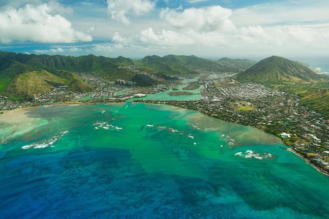 Private Oʻahu Helicopter Experience: All Window Seats - Mokoliʻi (Chinaman’s Hat) at Kualoa Beach Park: small island, big context