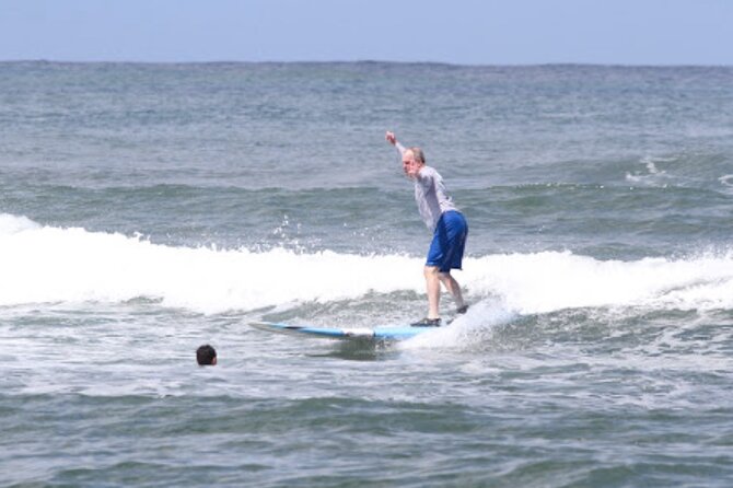 Private Surf Lessons in North Shore Oahu - In the water: how you go from paddling to standing