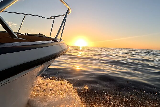 Sunset Cruise along Waikiki Coastline - What you’ll see: Diamond Head, Waikiki beaches, and the shoreline glow