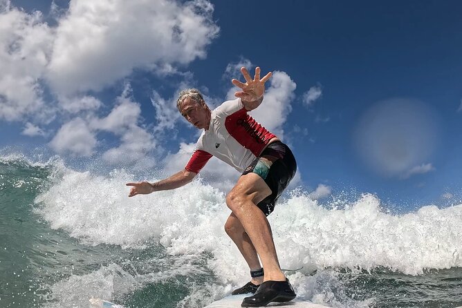 Surf Lessons get your Social Media video & photos you Surfing HI. - What you wear and why it helps you catch more waves